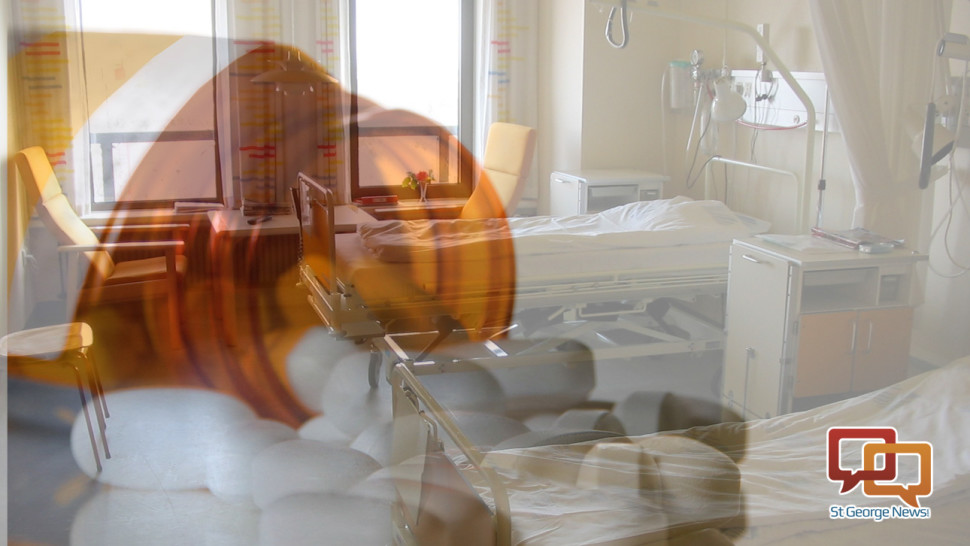 Uncapped amber medication bottle and tablets